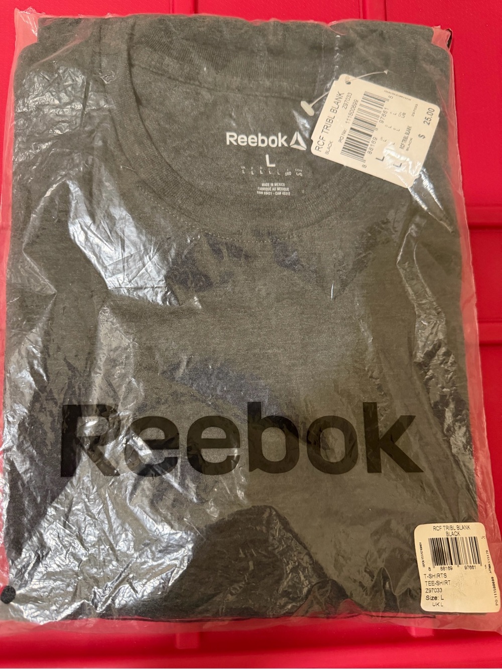 New Reebok black large crewneck tee